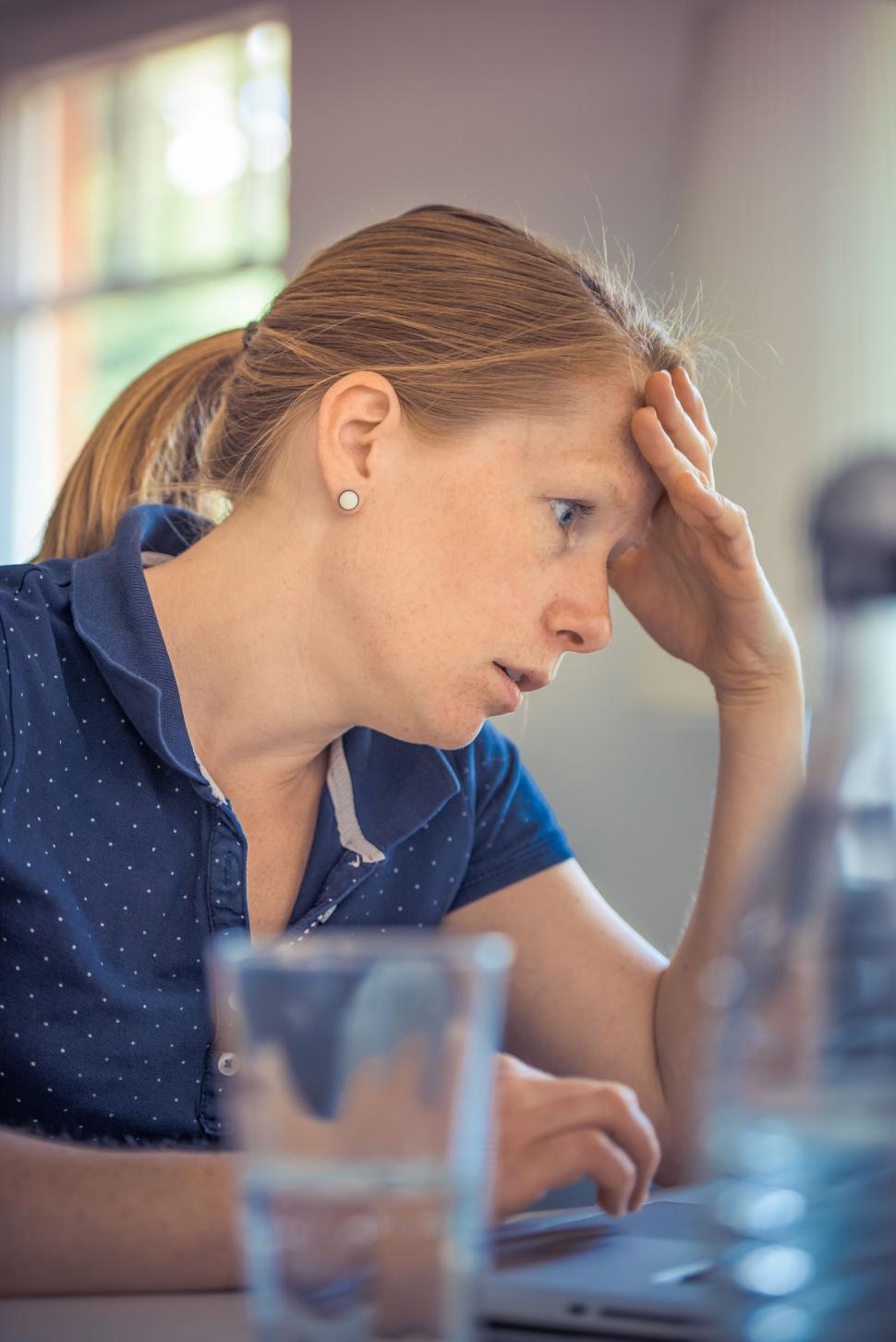 Free Image of Annoyed working woman  