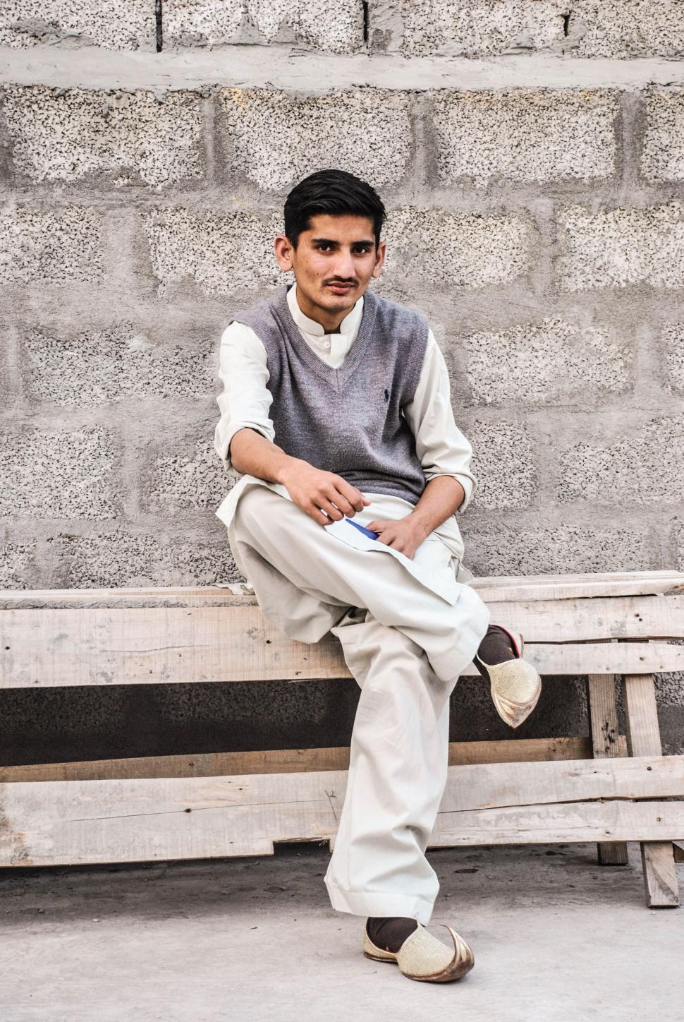 Free Image of Pakistani Man sitting outside  