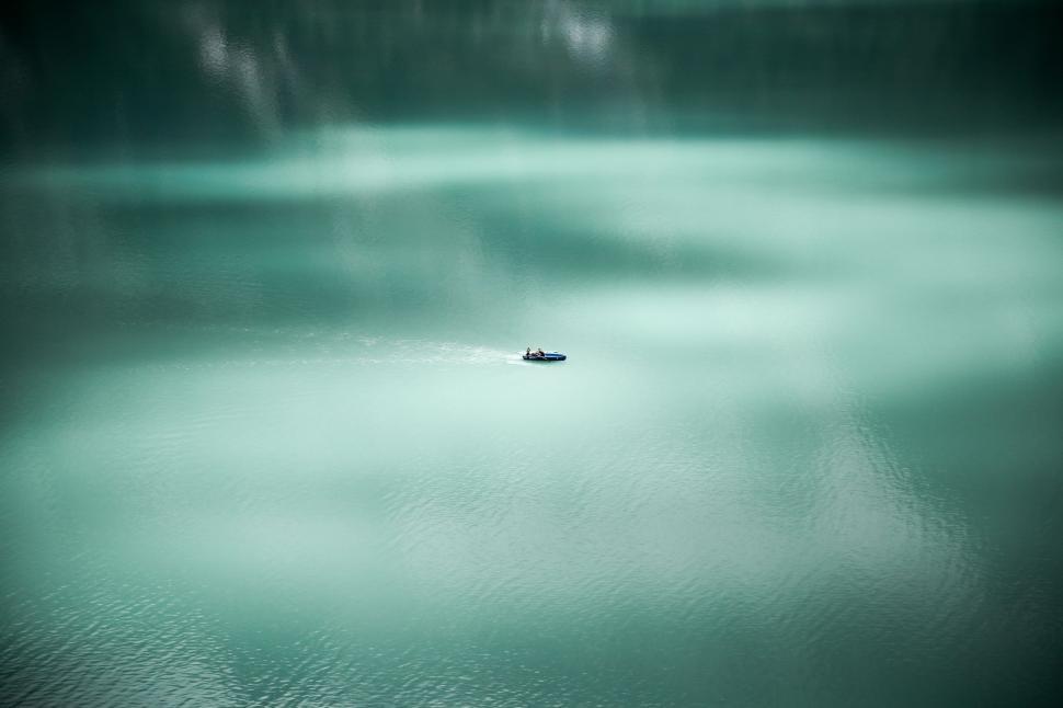 Free Image of Tiny Boat in Ocean  