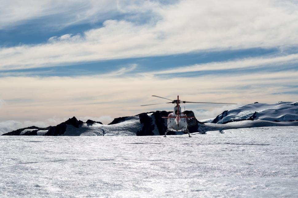 Free Image of Helicopter on Snow Mountain  