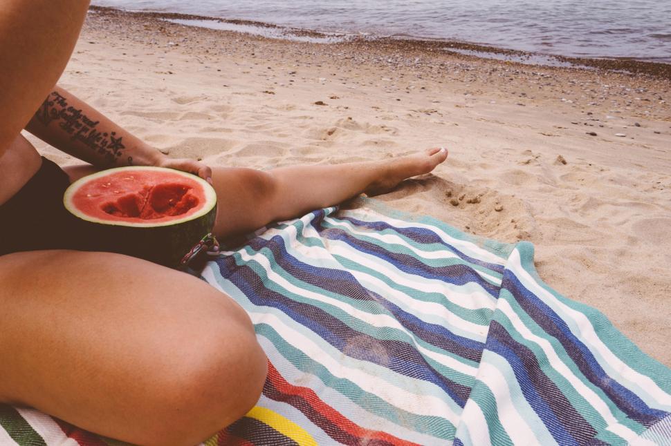 Free Image of Woman with watermelon on beach 