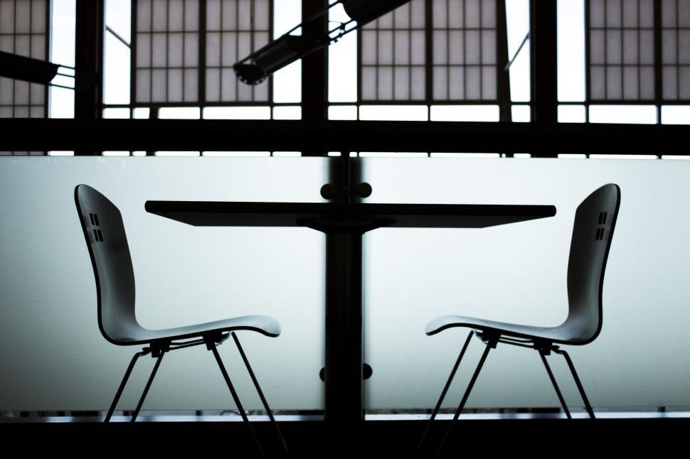 Free Image of Two Chairs and Table  