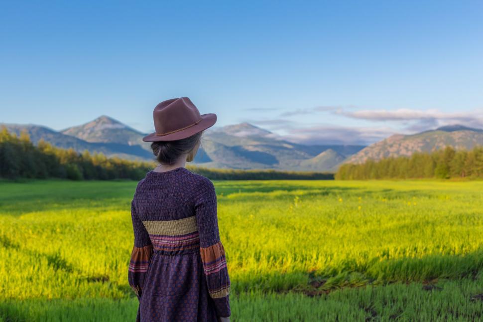 Free Image of Woman in Hat at Cropland  