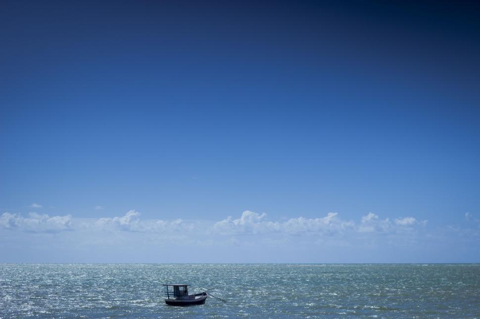 Free Image of Single Boat in Ocean  