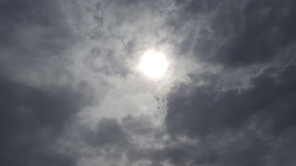 Free Image of Sun and Dark Clouds  