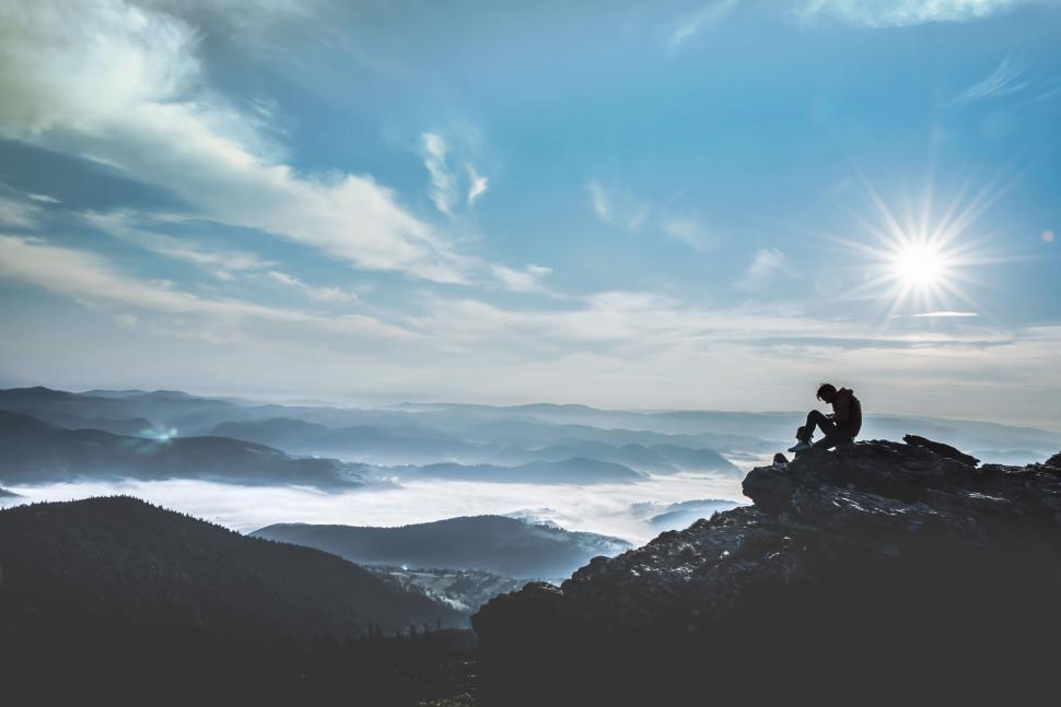 Free Image of Silhouette of man on mountain 