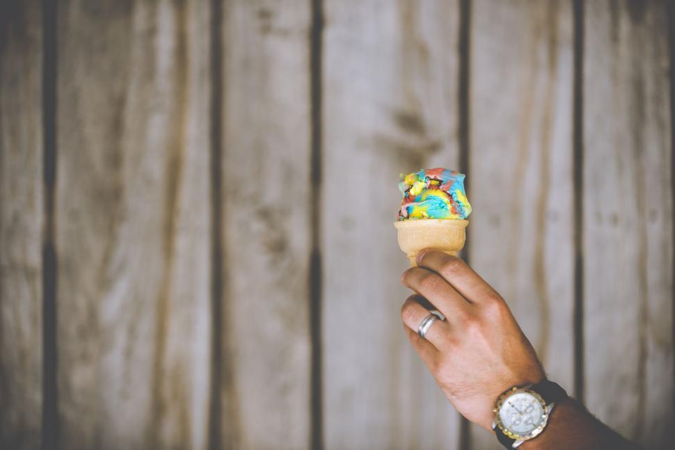 Free Image of Colorful Ice Cream Cone in hand 