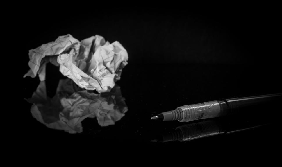 Free Image of Crumpled paper and pen 