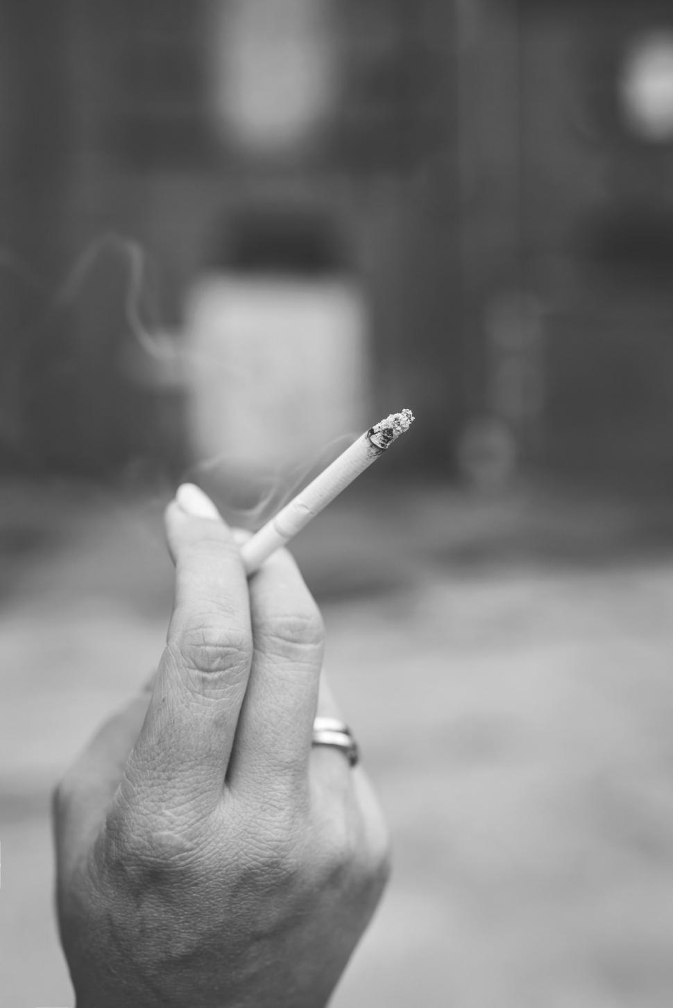 Free Image of Burning Cigarette and hand 
