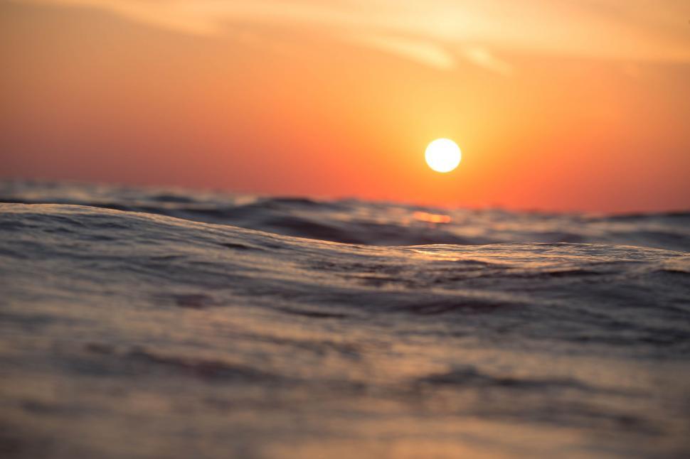 Free Image of Ocean and Yellow Sun  