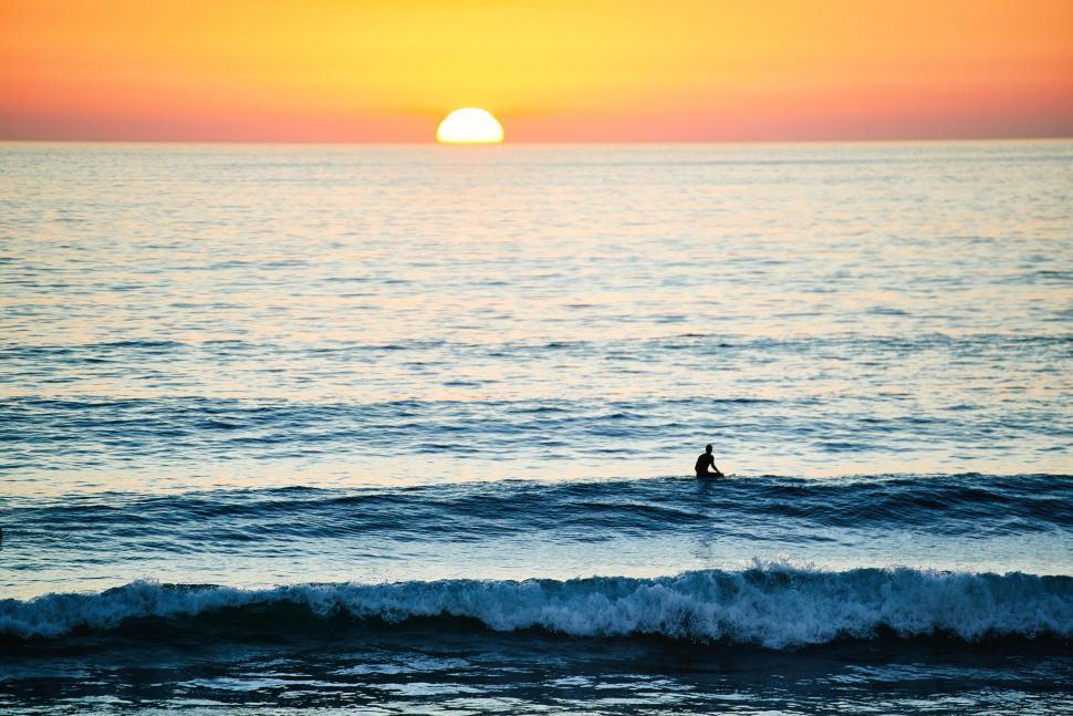 Free Image of Surfer, Ocean and Sun  