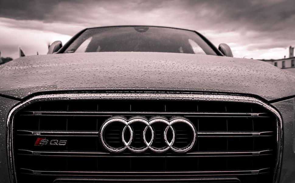 Free Image of Audi Car with dark clouds 