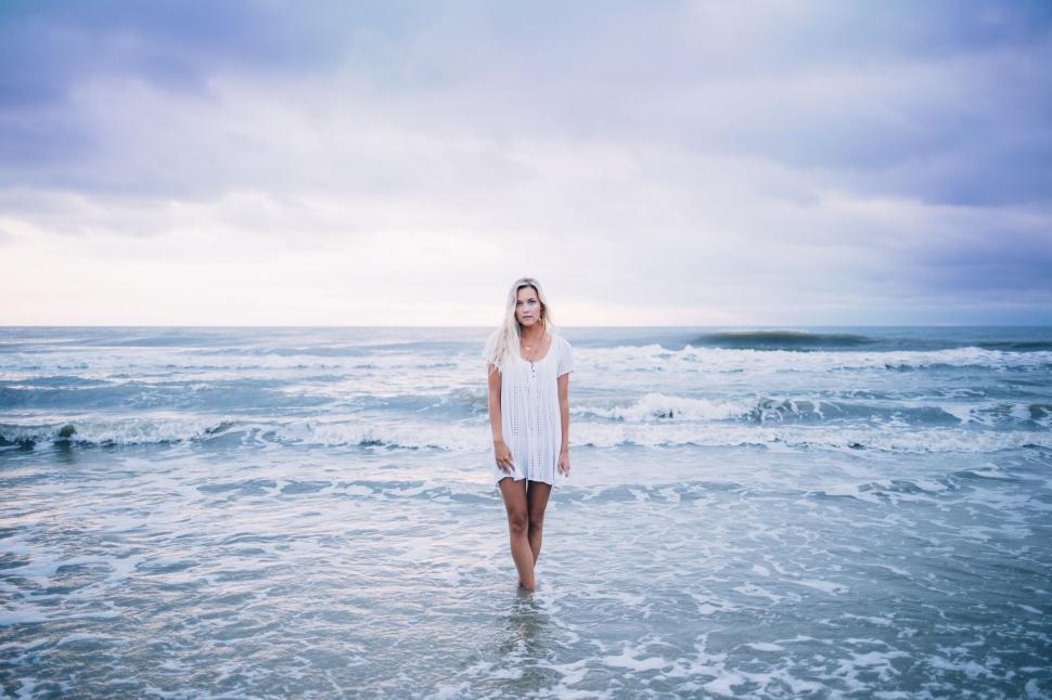 Free Image of Blonde Woman Posing at beach  