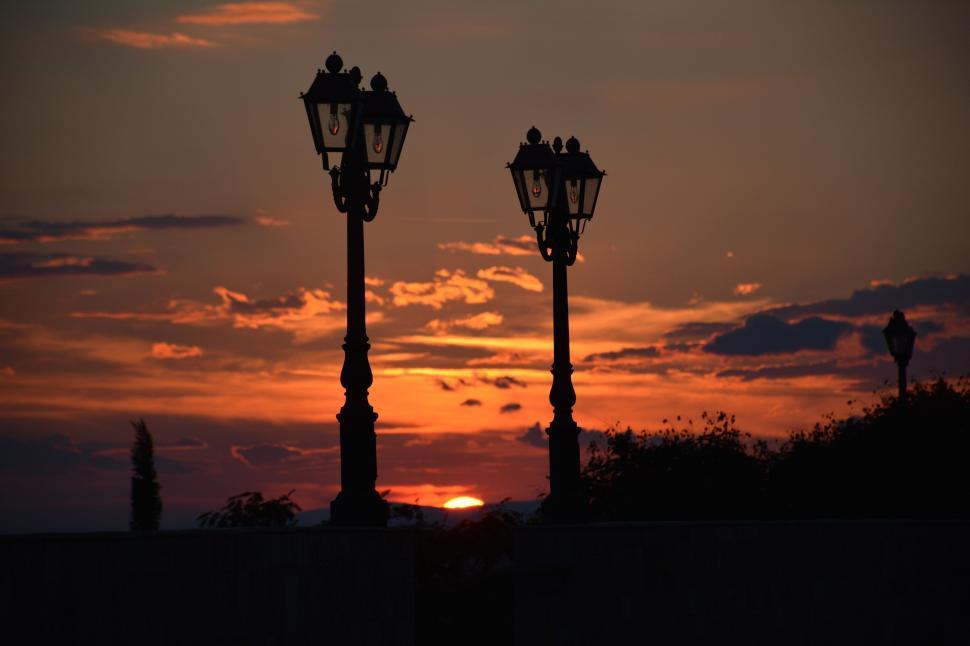 Free Image of Lamp Posts and Sunset  