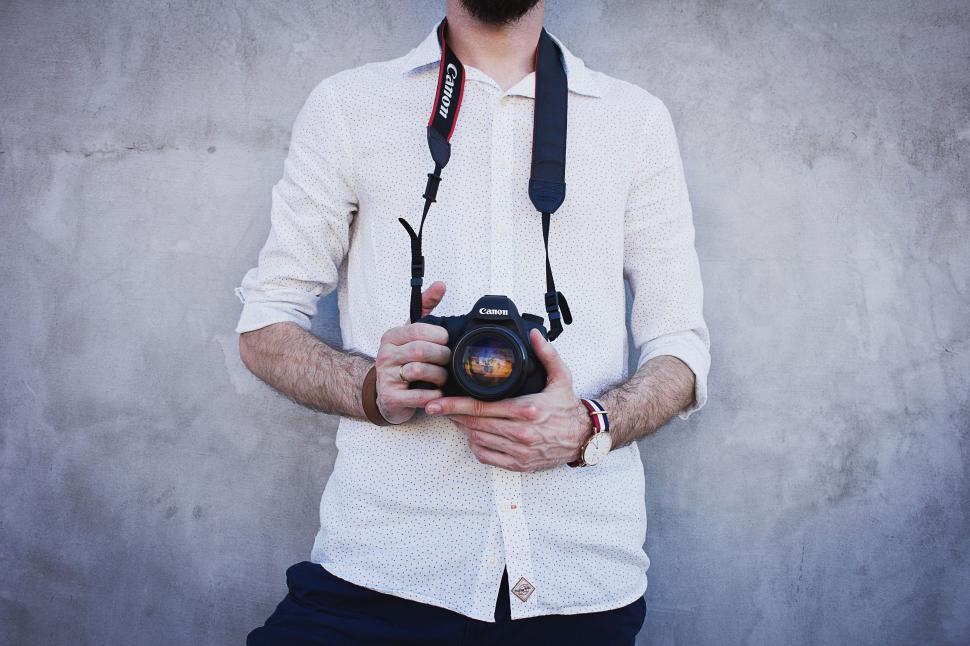 Free Image of Male Photographer with Camera  