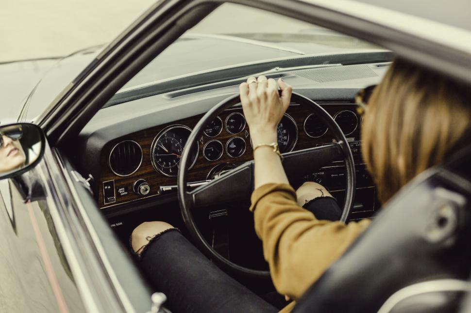 Free Image of Female hands on Steering Wheel  
