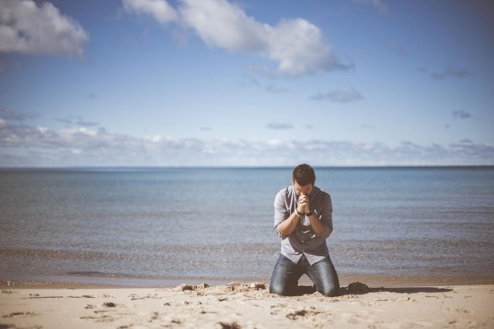 Free Image of Praying on Beach  