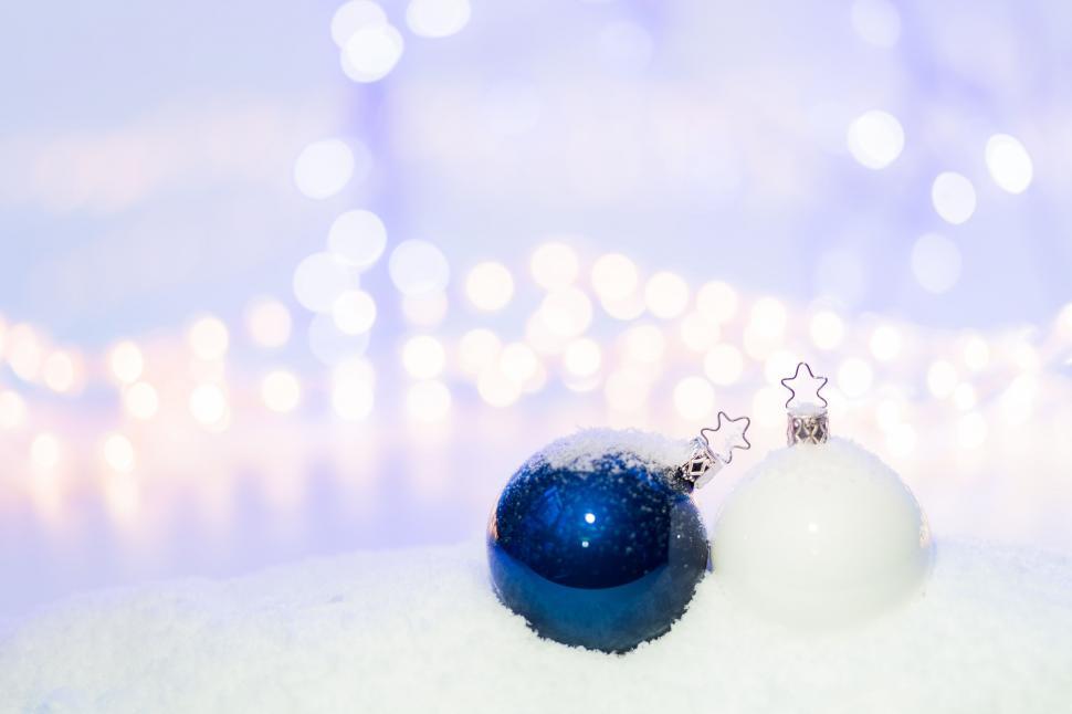 Free Image of Two Christmas balls on snow  