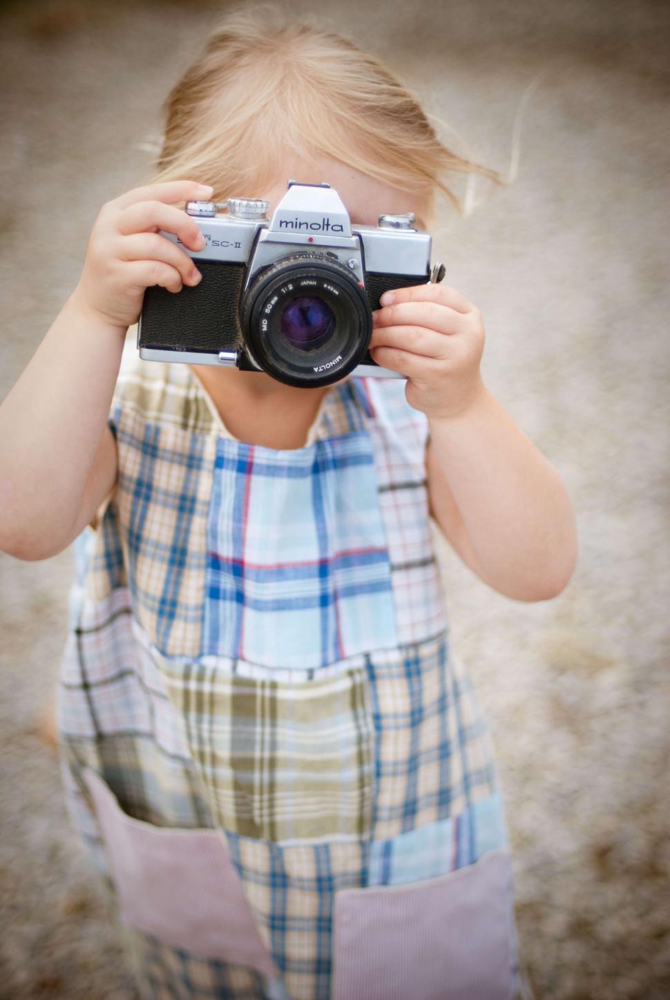 Free Image of Little Girl with Camera  