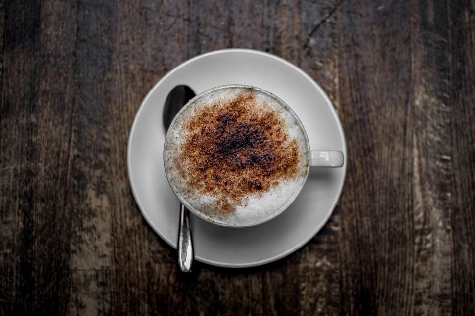 Free Image of Cappuccino Coffee on wooden table  