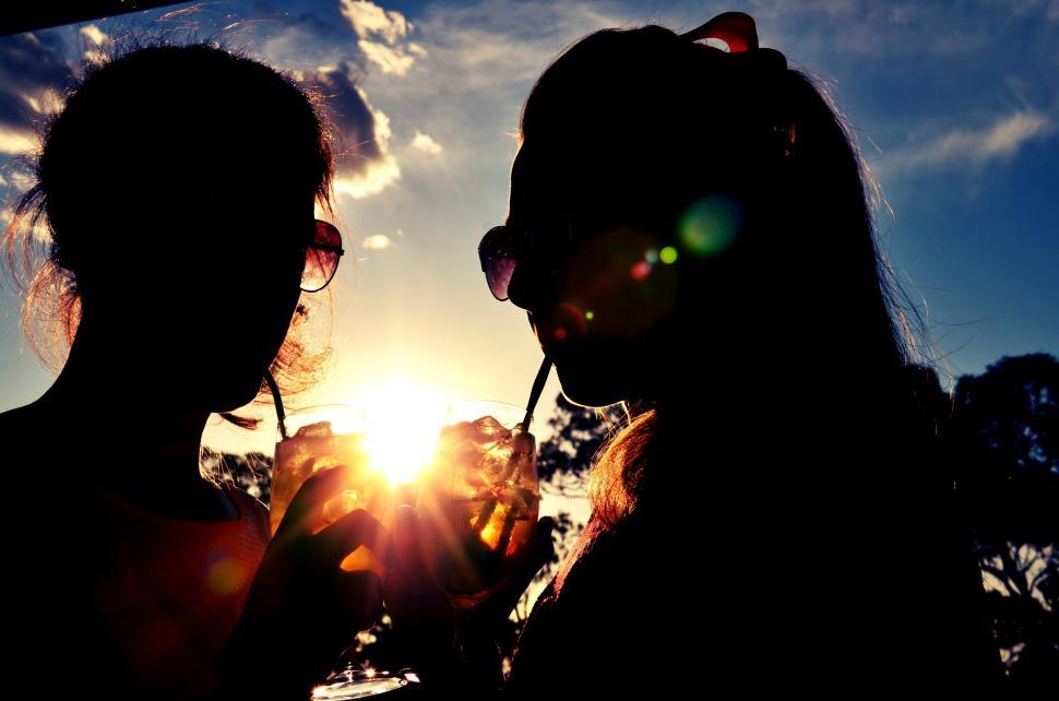 Free Image of Women in Sunglasses with sun glare  