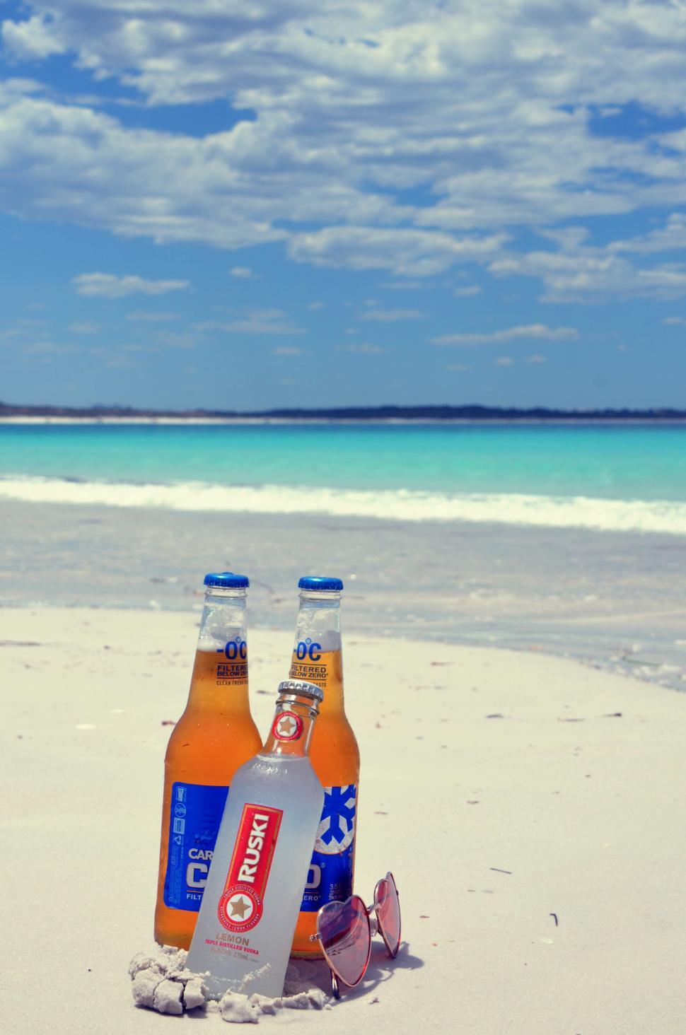 Free Image of Beer Bottles at beach  