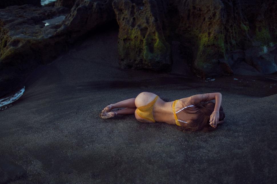 Free Image of Alone Bikini Woman relaxing on beach 