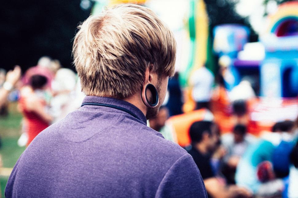 Free Image of Back side view of man with big ear ring  