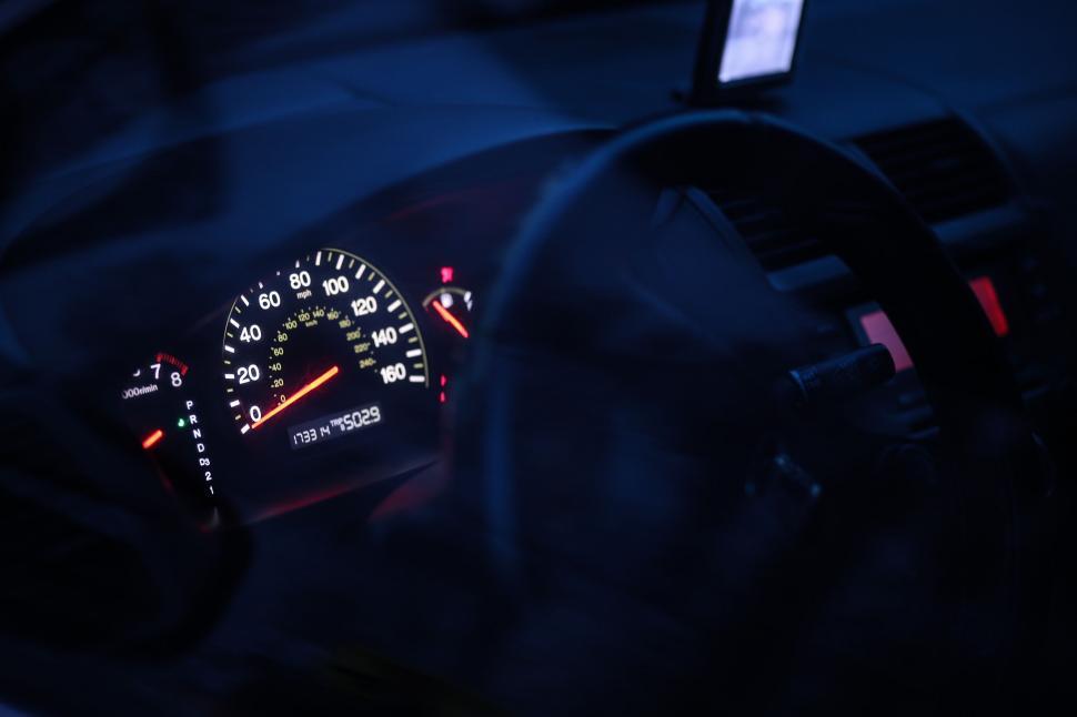Free Image of Speedometer and steering wheel 