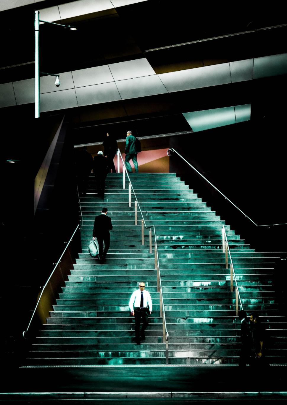 Free Image of Night View of People on stairs  