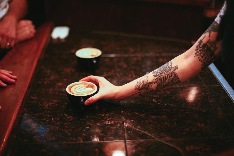 Free Image of Coffee Cup and Tattoo Hand  