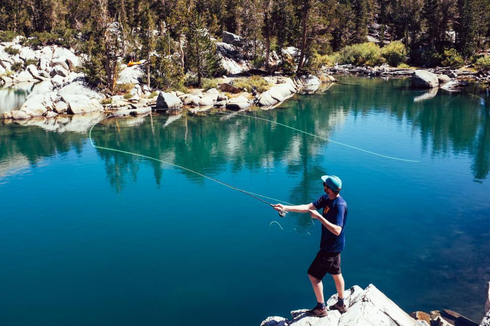 Free Image of Man with Fishing Rod  