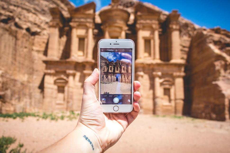 Free Image of Taking picture of The Monastery of Petra with iPhone  