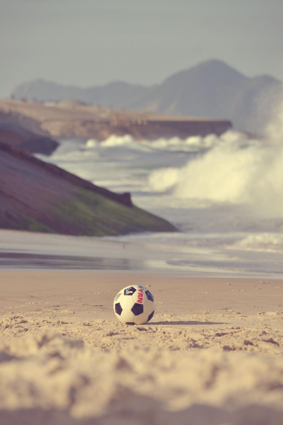 Free Image of Football on Beach  