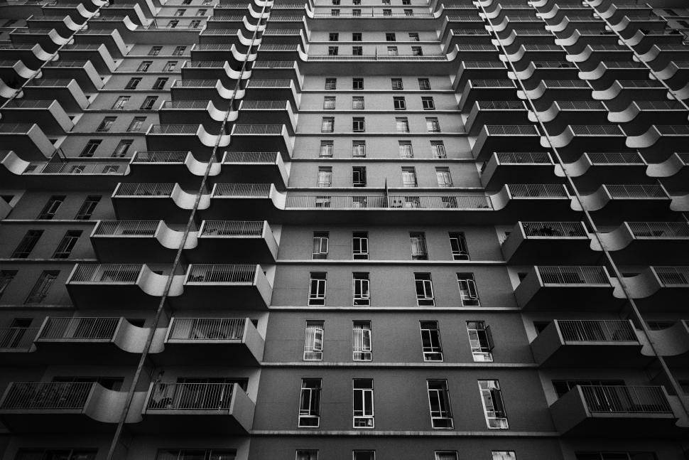 Free Image of Residential Tower with Balconies From Below  
