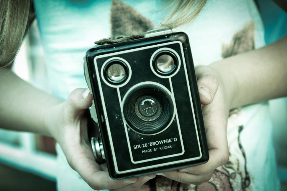 Free Image of Woman Hands and Vintage Camera  