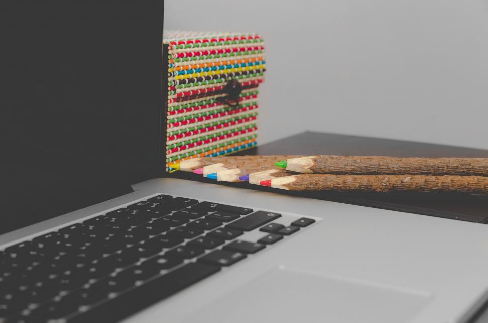 Free Image of Wooden Colored Pencils and Laptop  