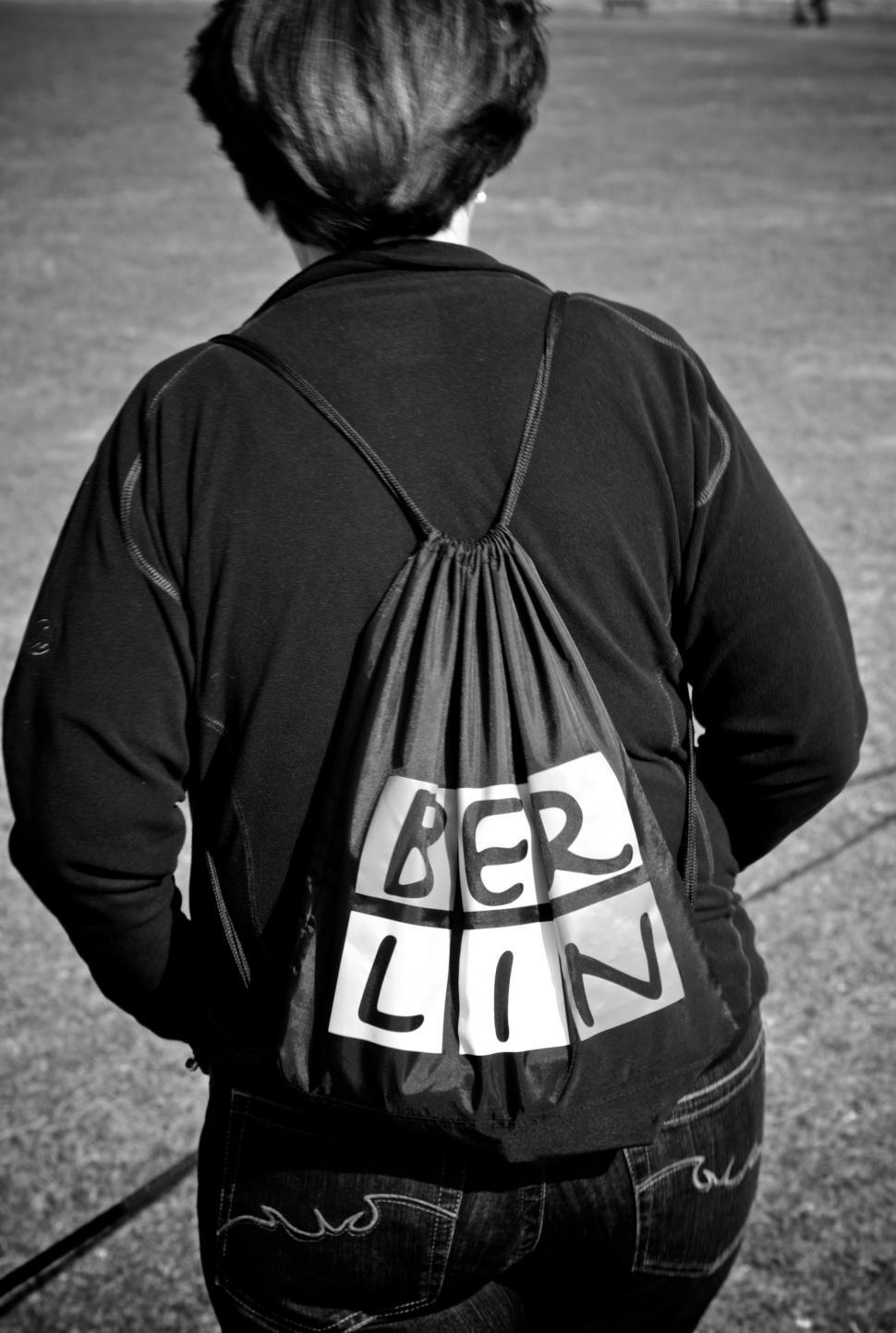 Free Image of Person Carrying Bag on Back 