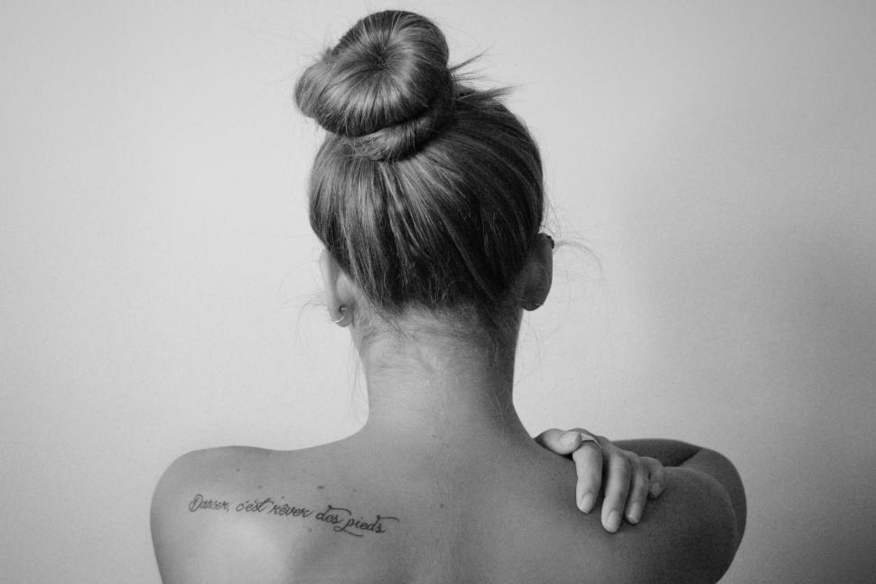 Free Image of Backside view of woman with tattoo  