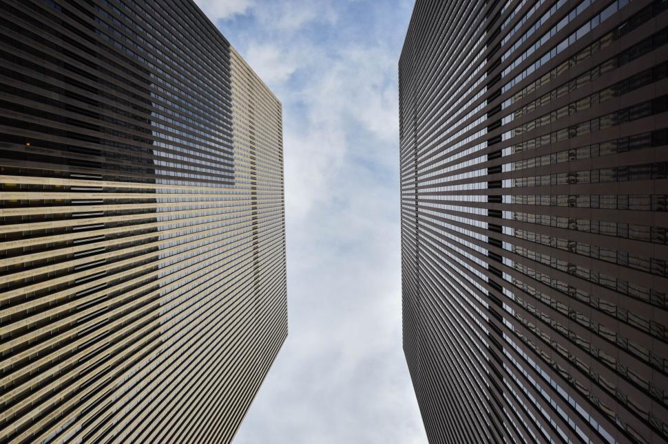 Free Image of Two Towers and Sky from below  