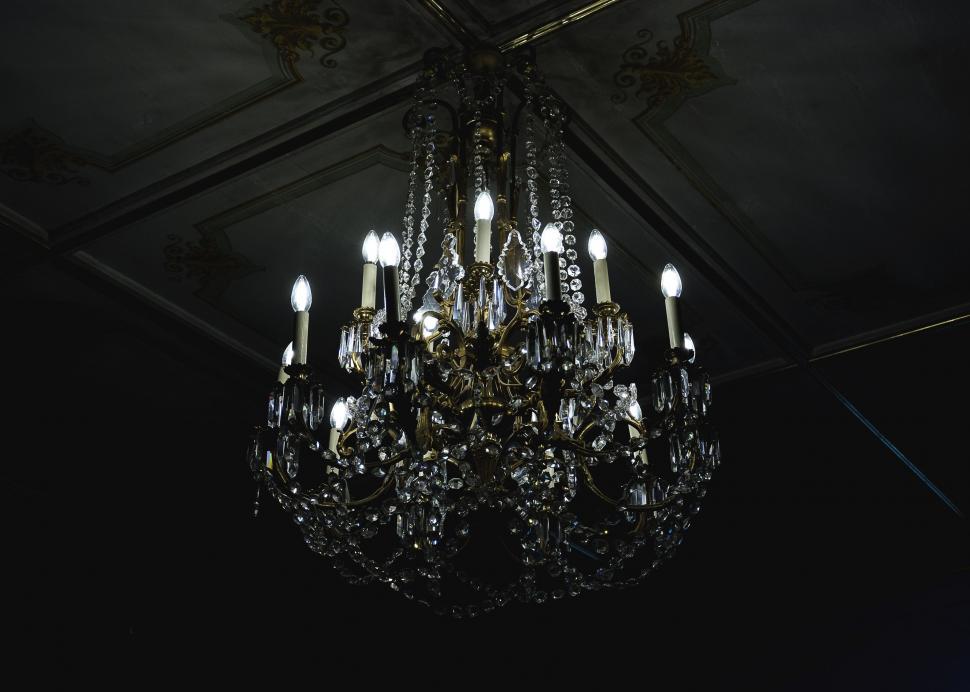 Free Image of illuminated Chandelier in dark room  