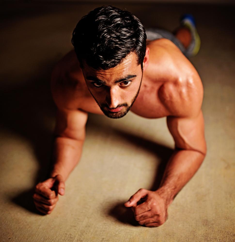 Free Image of Young Indian Man Doing push-ups 