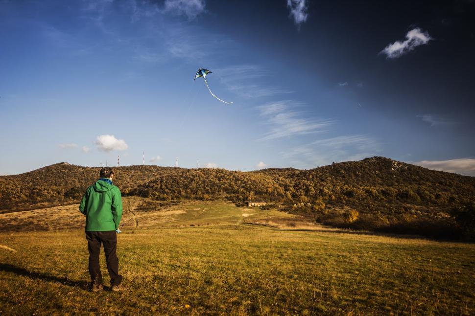 Free Image of Man Flying Kite 