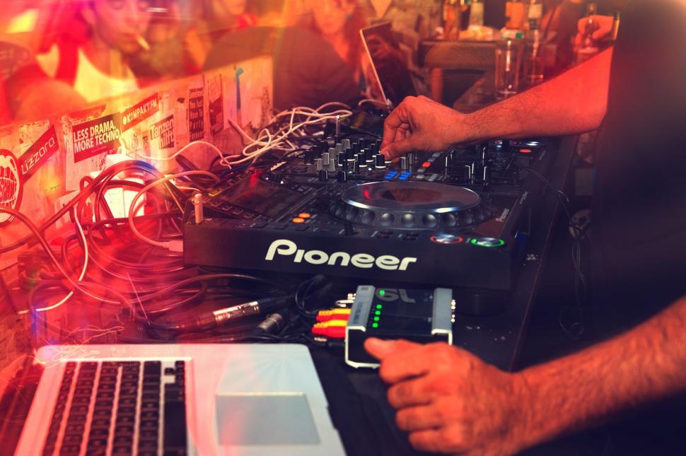 Free Image of DJ with music equipment and laptop 