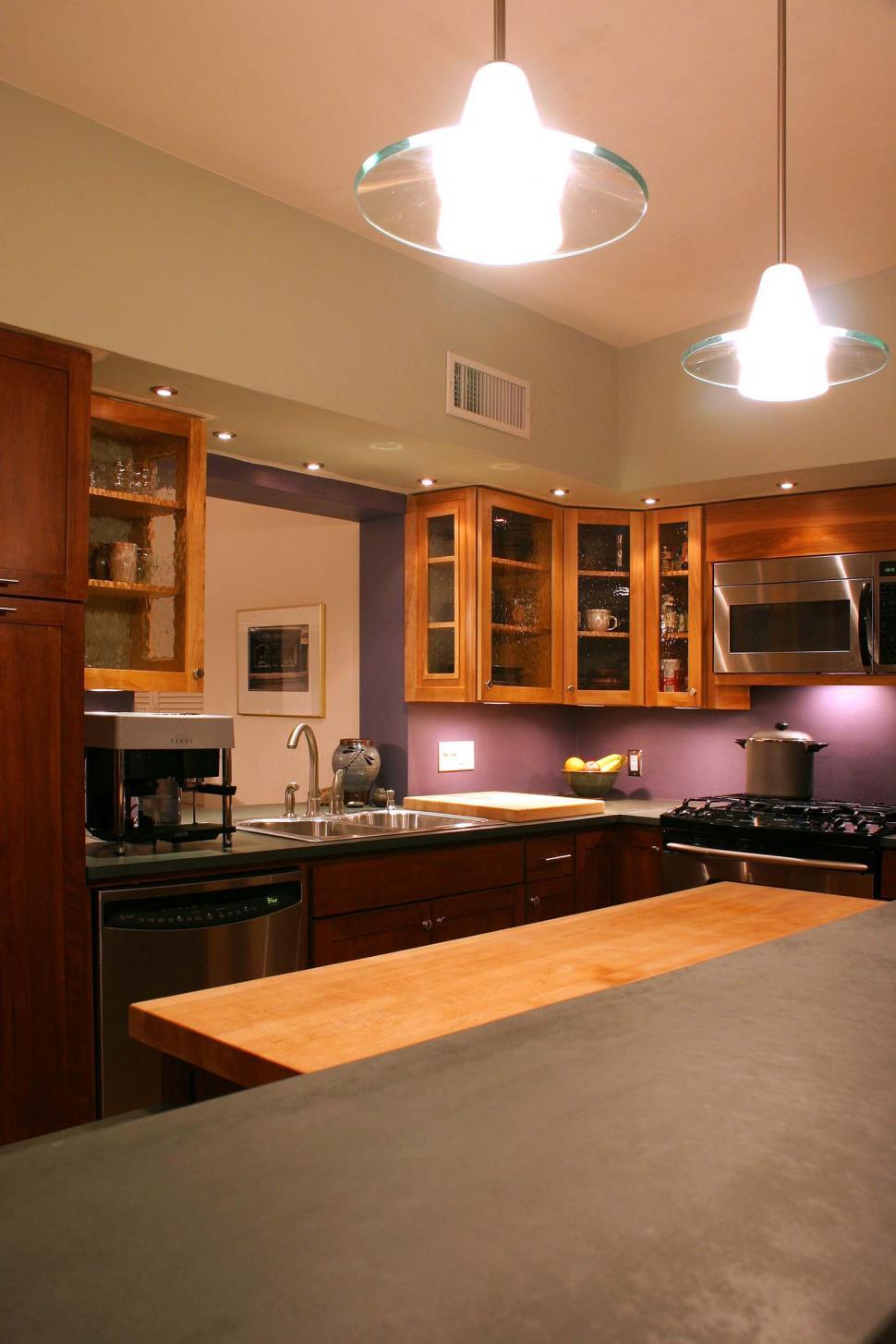 Free Image of Modern Kitchen With Wooden Cabinets and Stainless Steel Appliances 