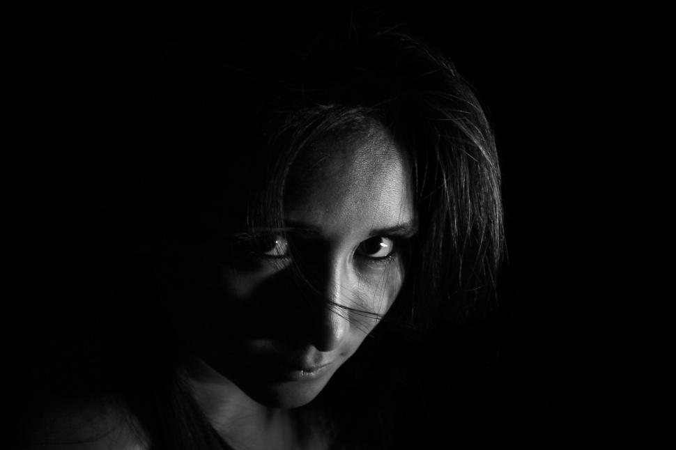 Free Image of Dark View close up of Woman Face  