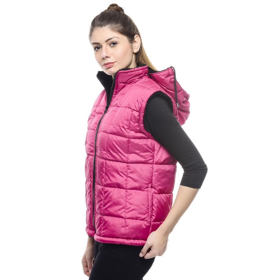 Free Image of Young Woman in Quilted Vest Jacket 