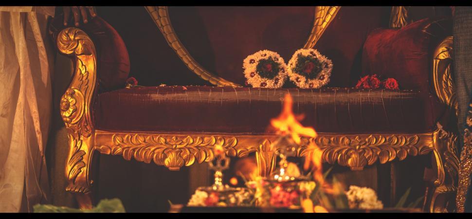 Free Image of Hindu Wedding Chair with burning firewood 