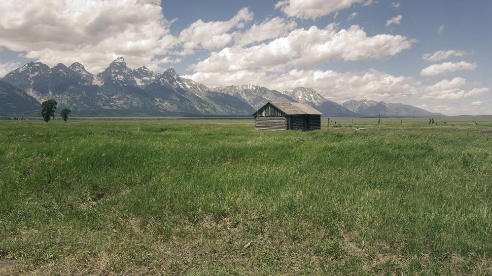 Free Image of Cabin House on green grass  