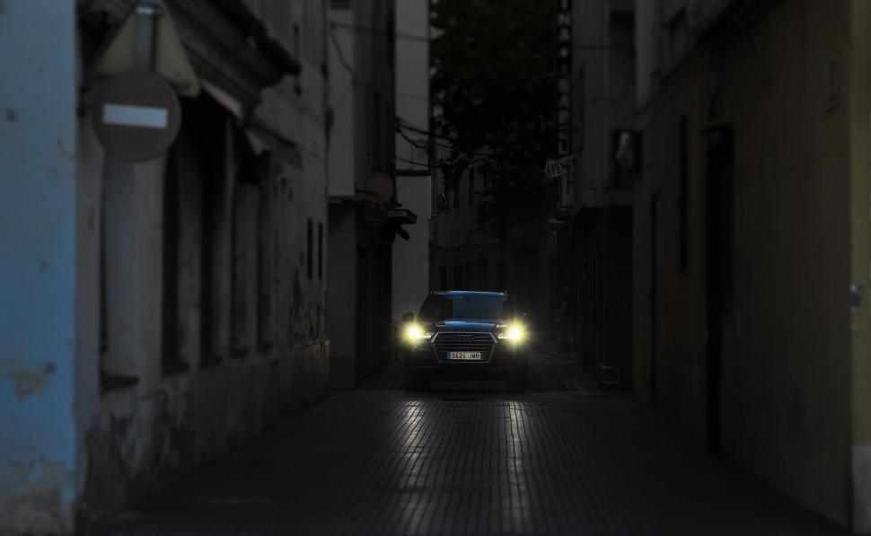 Free Image of Audi Car with Illuminated Headlights 